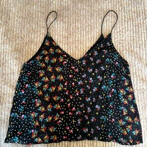Black tank top with floral and polka dot design